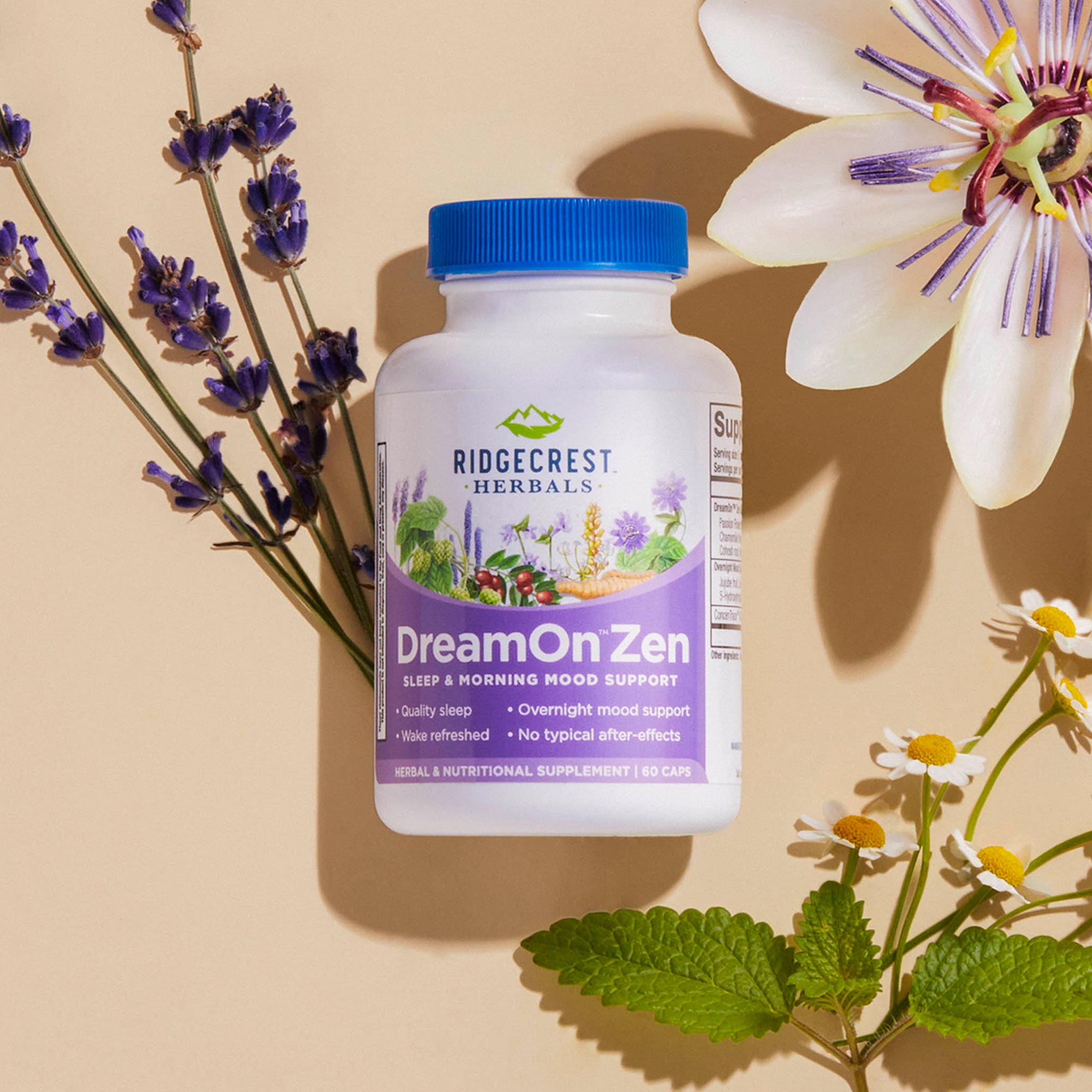DreamOn Zen supplement is displayed with lavender, passionflower, chamomile, and lemon balm leaves, set against a beige background.