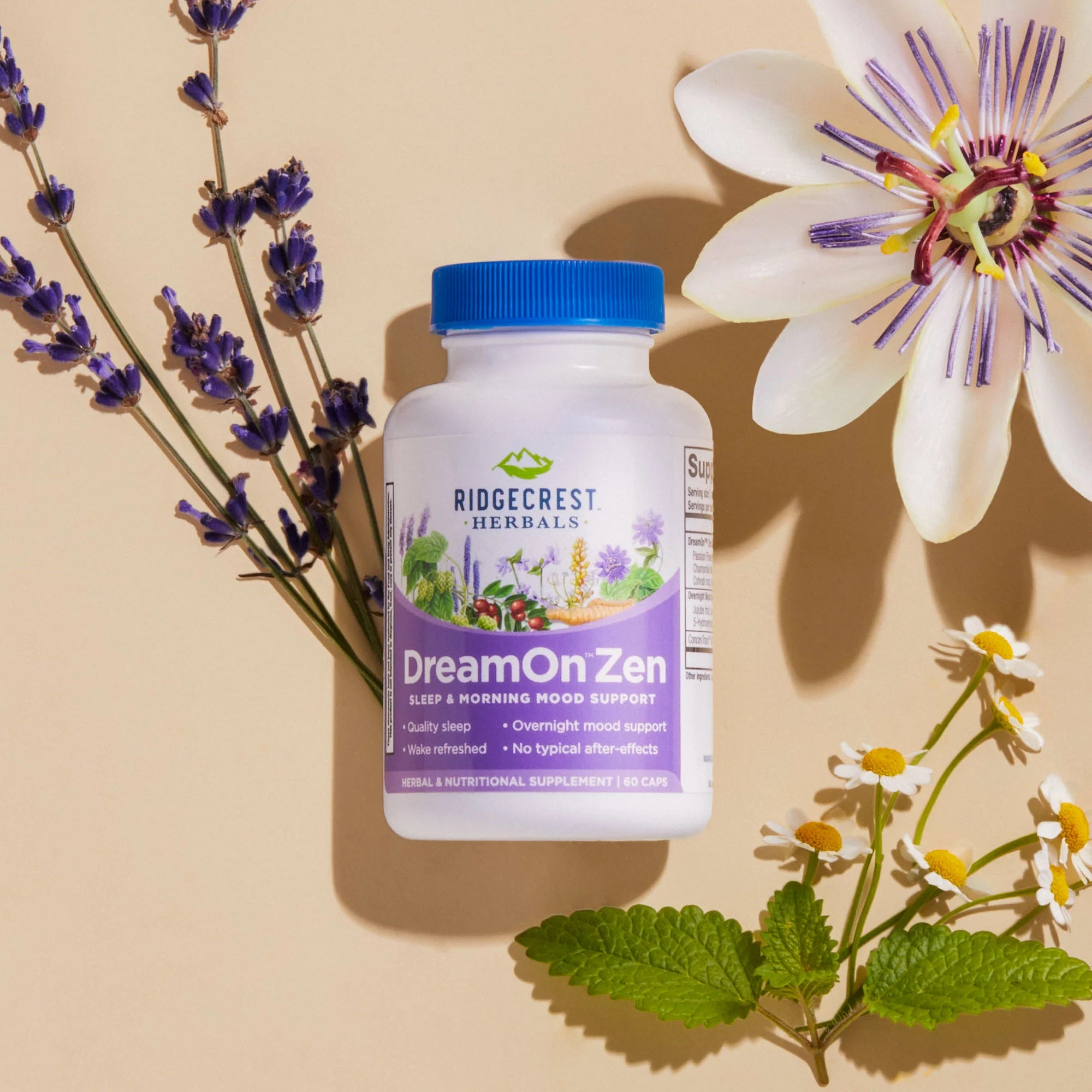 DreamOn Zen supplement is displayed with lavender, passionflower, chamomile, and lemon balm leaves, set against a beige background.