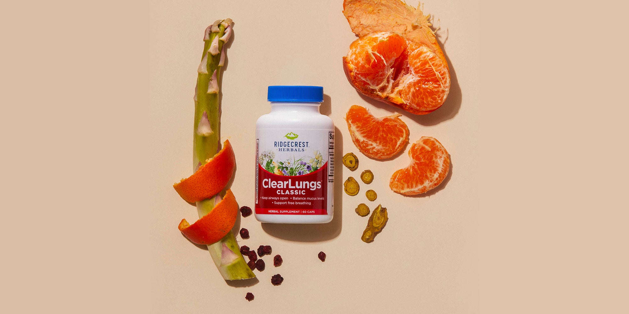 ClearLungs Classic supplement is displayed with a bamboo shoot, orange peel, peeled mandarin segments, and dried herbs, set against a beige background.