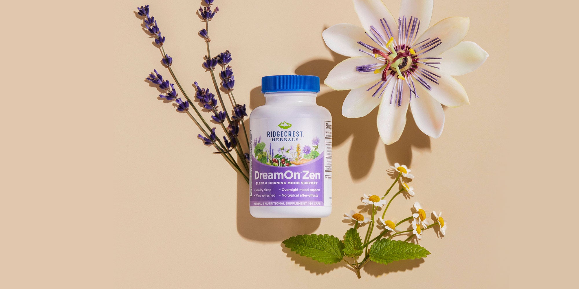 DreamOn Zen supplement is displayed with lavender, passionflower, chamomile, and lemon balm leaves, set against a beige background.