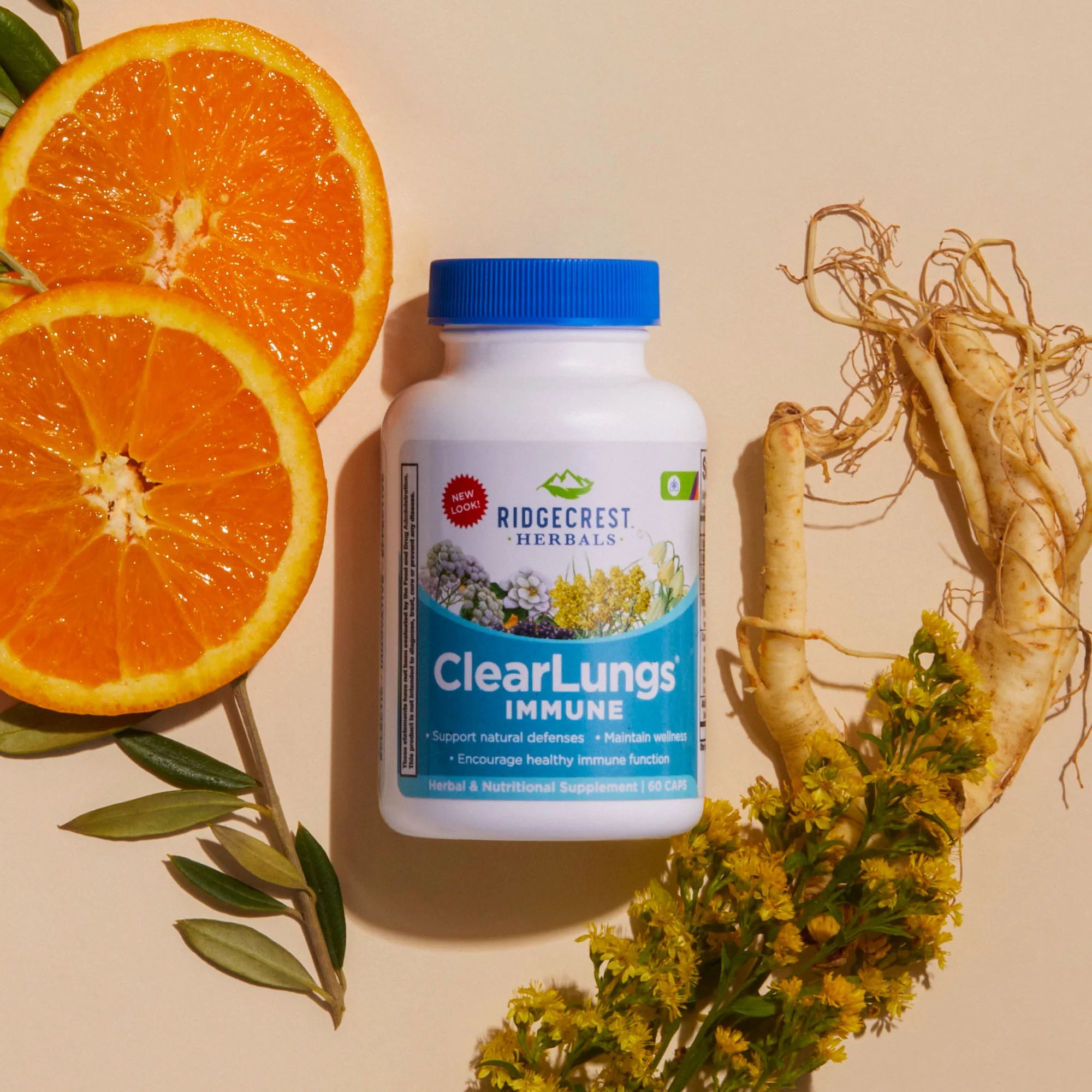 ClearLungs Immune supplement is displayed with sliced oranges, ginseng roots, and yellow flowers, set against a beige background.