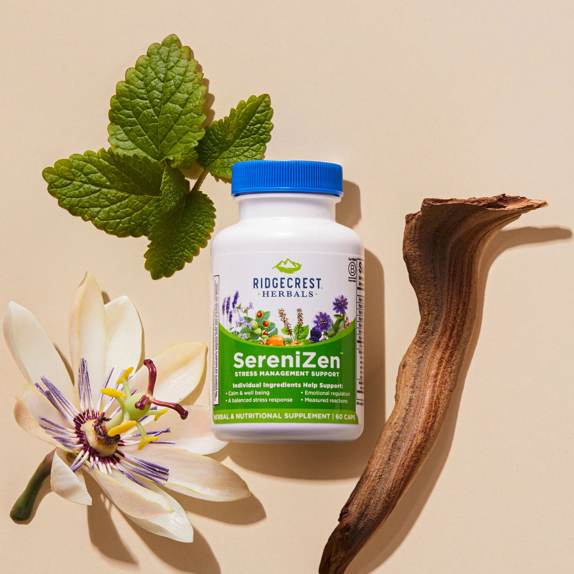 SereniZen supplement on a cream background surrounded by passion flower, lemon balm, and Valarian root. 